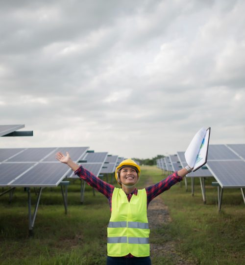 engineer-electric-woman-checking-maintenance-solar-cells
